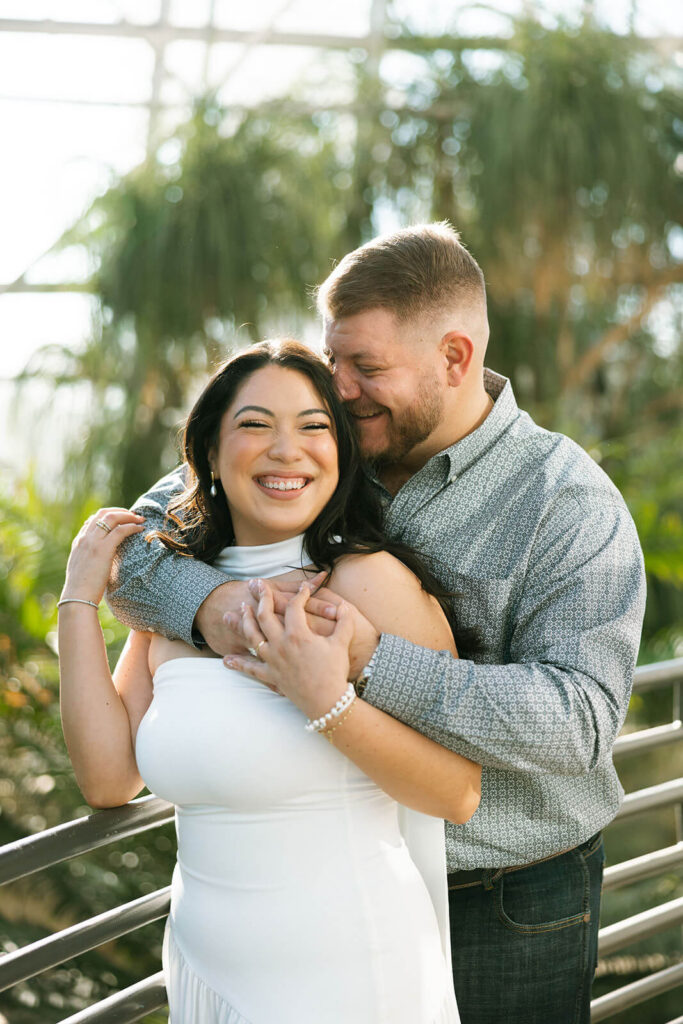 Close up of a happy could in a tight embrace with golden hour light